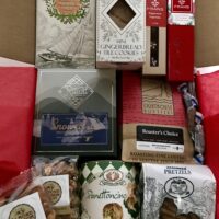 Holiday Celebration Box - holiday snacks, panettone, Lighthouse Roasters coffee, Fran's Chocolates, & drinking chocolate