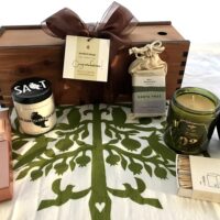 Eco-friendly Housewarming Gift Box - $150 : beautiful cedar wine box filled with housewarming products: San Juan Sea Salt, screen-printed tree towel, beeswax candle, Fran's Caramels, & more.